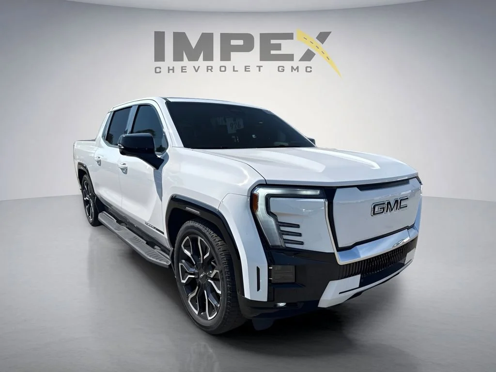 Used 2025 Summit White GMC Max Range Denali image 5