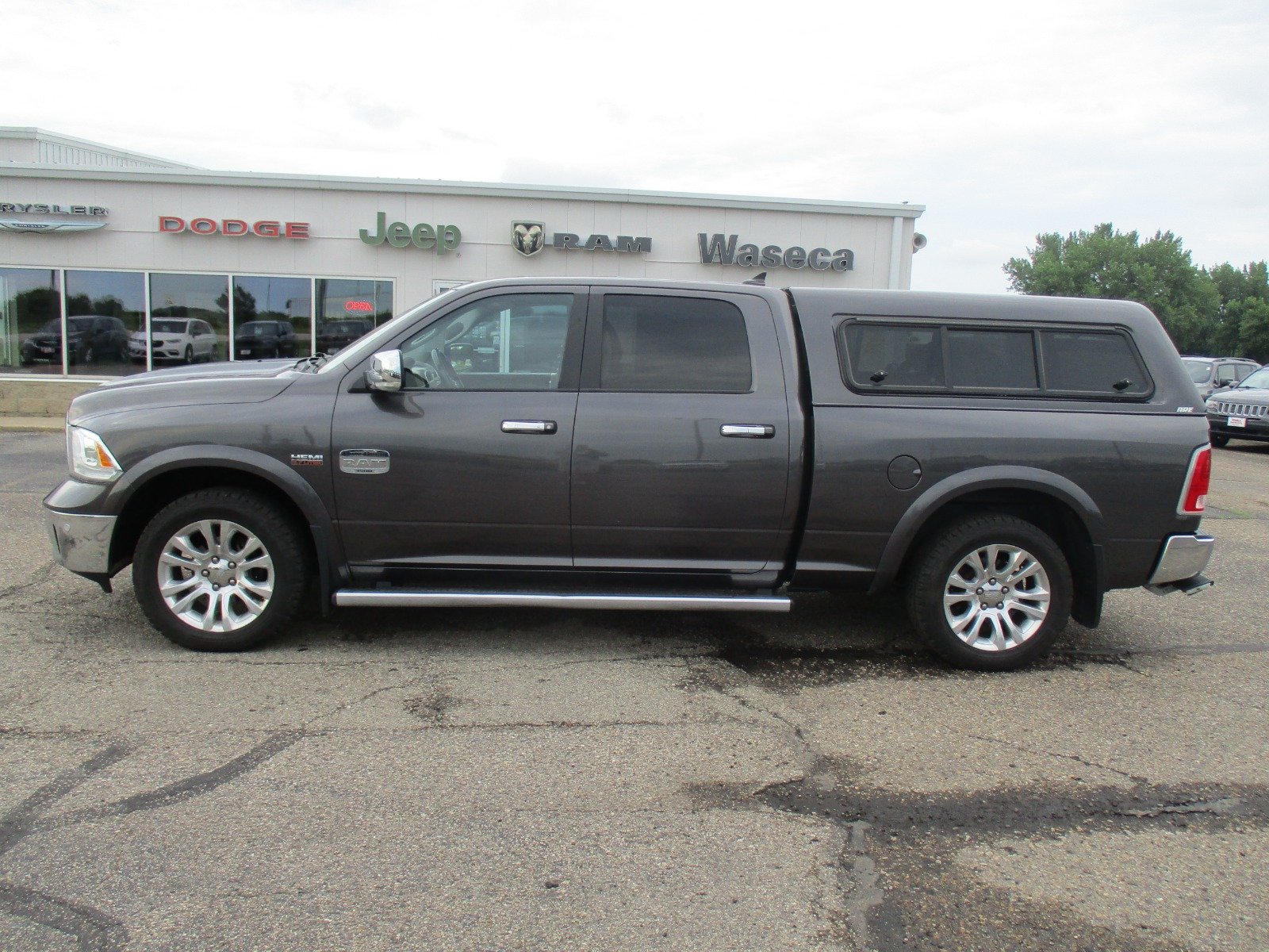 Used 2015 RAM Ram 1500 Pickup Laramie Limited with VIN 1C6RR7WT6FS674259 for sale in Waseca, Minnesota