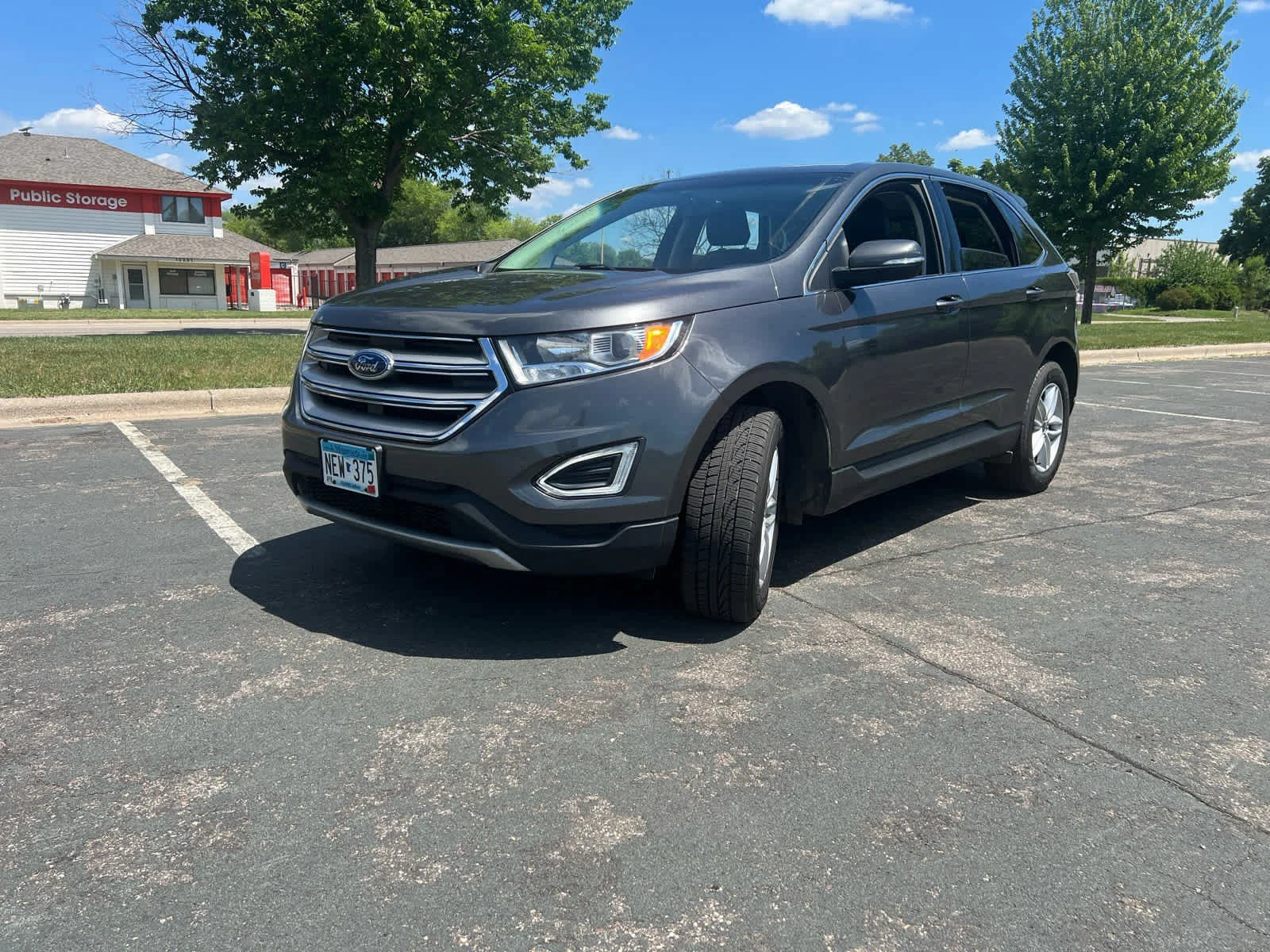 Used 2015 Magnetic Metallic Ford SEL image 3