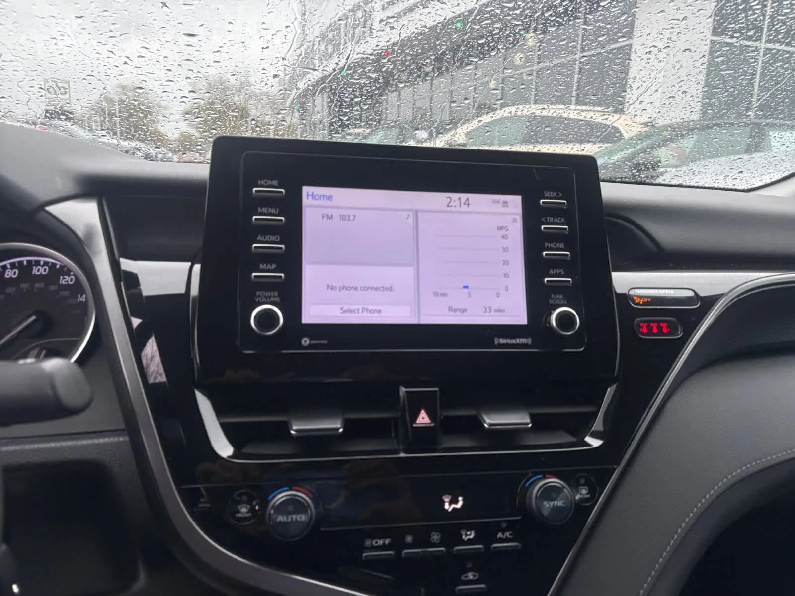 Used 2023 Midnight Black Metallic Toyota LE image 19