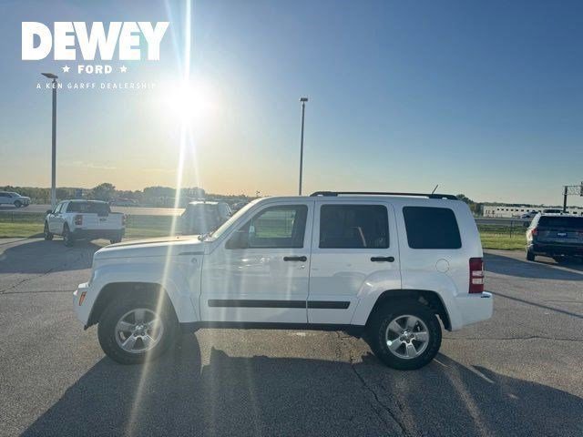 Used 2012 Bright White Jeep Sport image 7