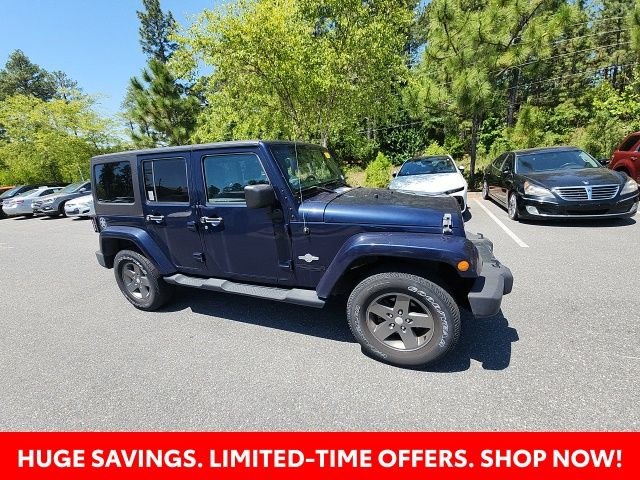 Used 2013 Blue Jeep Unlimited Sport image 20