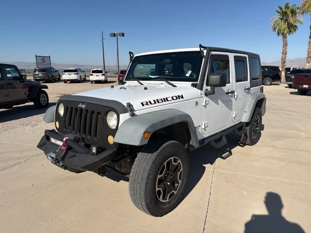 Used 2012 White Jeep Unlimited Rubicon image 1