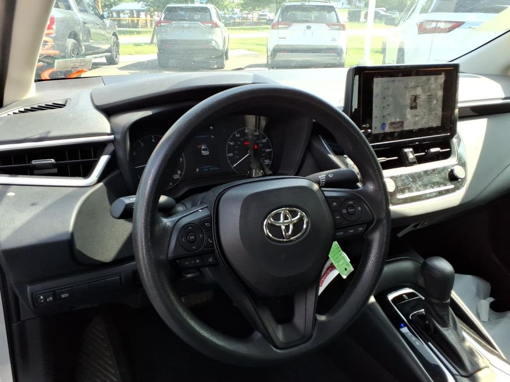 Used 2023 Classic Silver Metallic Toyota LE image 11