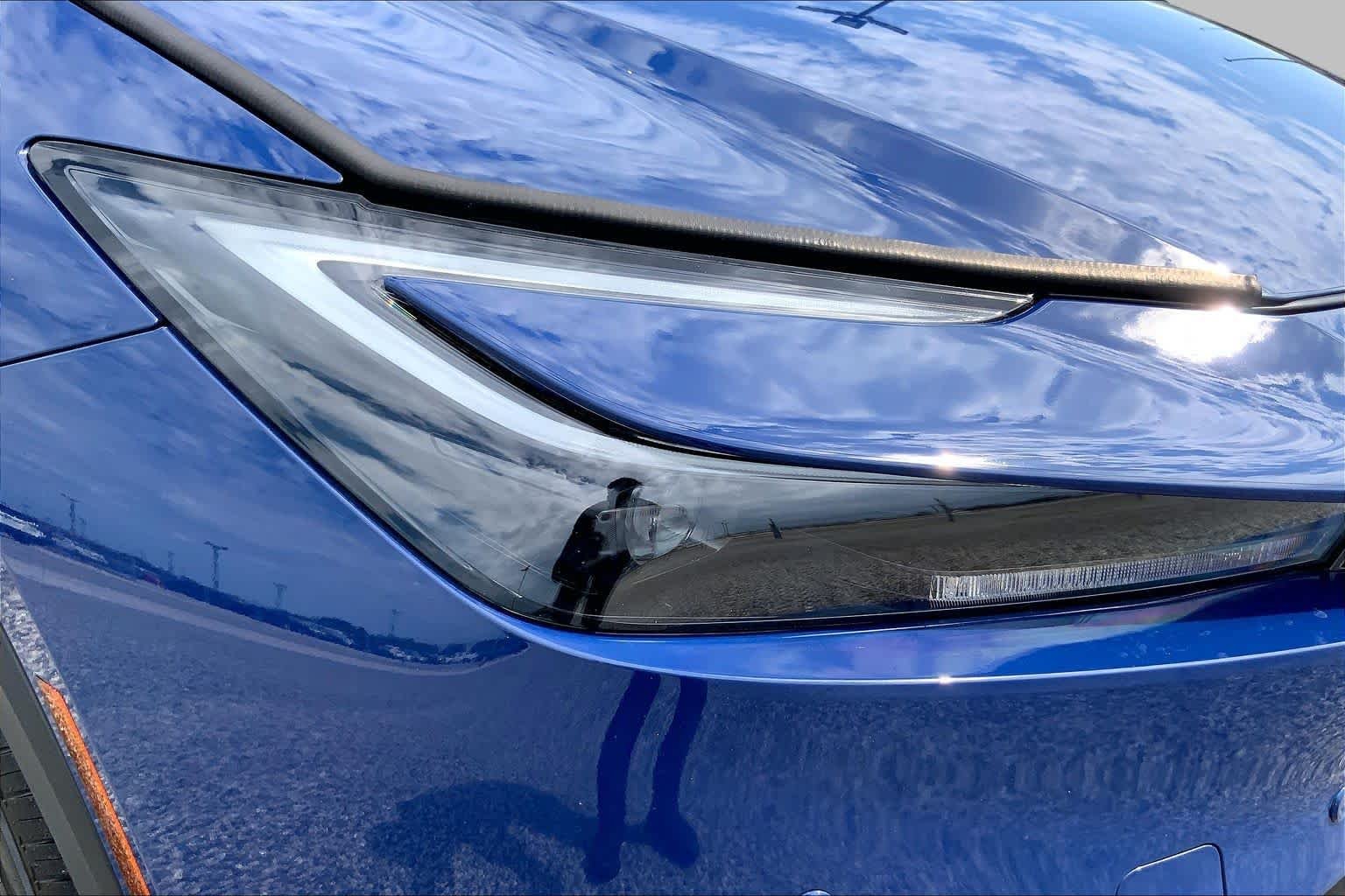 Used 2025 Reservoir Blue Toyota LE image 27