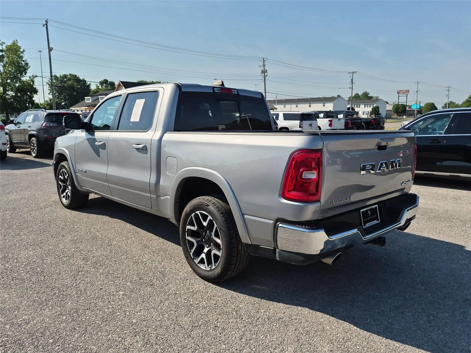 Used 2025 Billet Silver Metallic Clearcoat Ram Laramie image 3