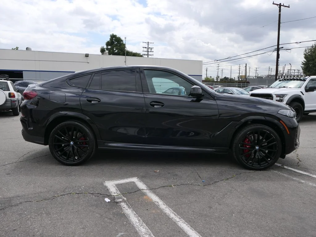 Used 2024 Black Sapphire Metallic BMW xDrive40i image 2
