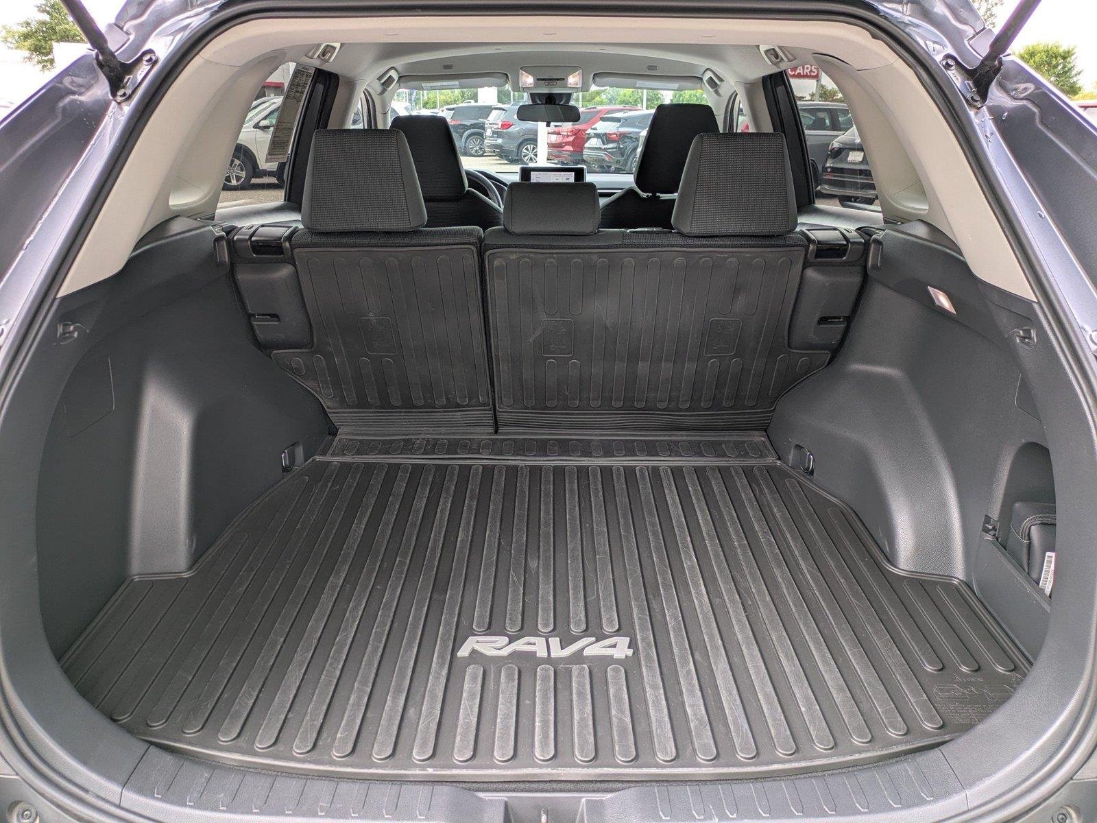 Used 2024 Magnetic Gray Metallic Toyota LE image 13