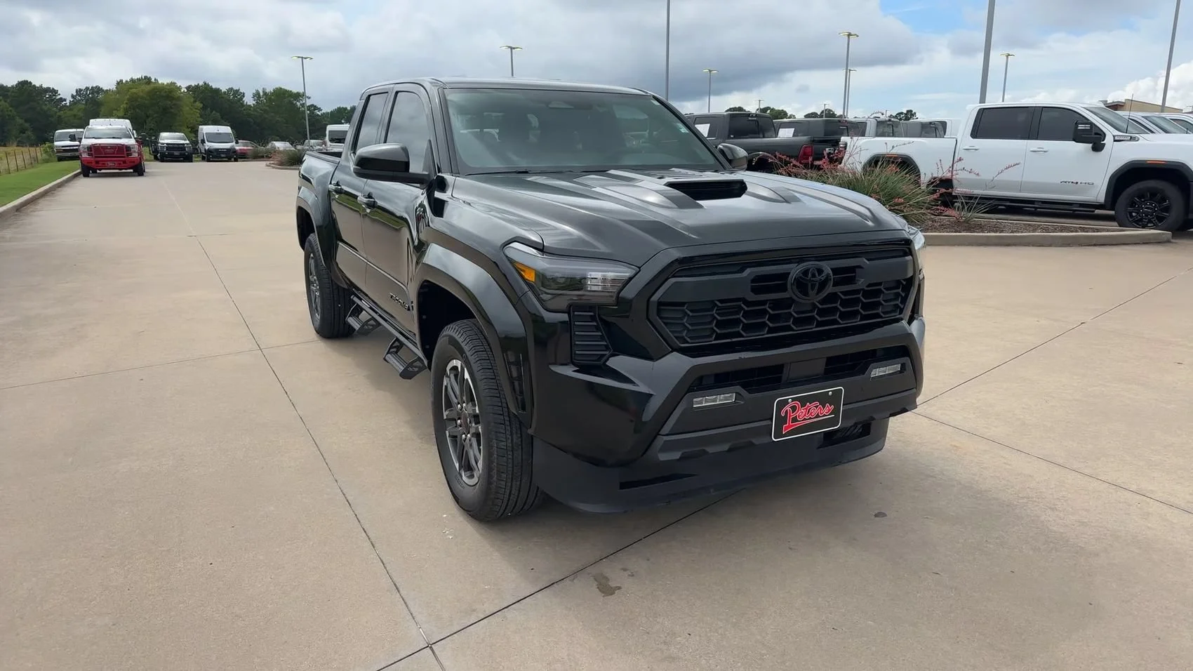 Used 2025 Black Toyota TRD Sport image 2
