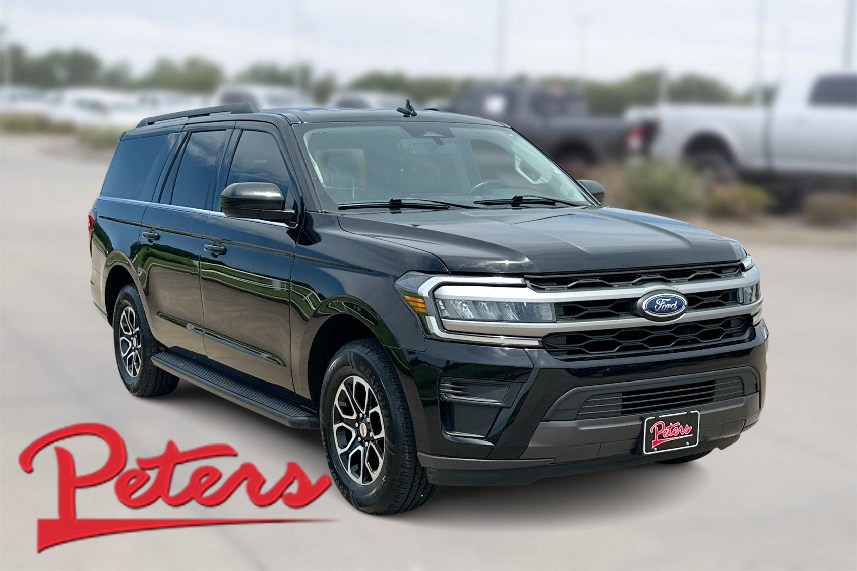 Used 2024 Black Metallic Ford XLT image 1
