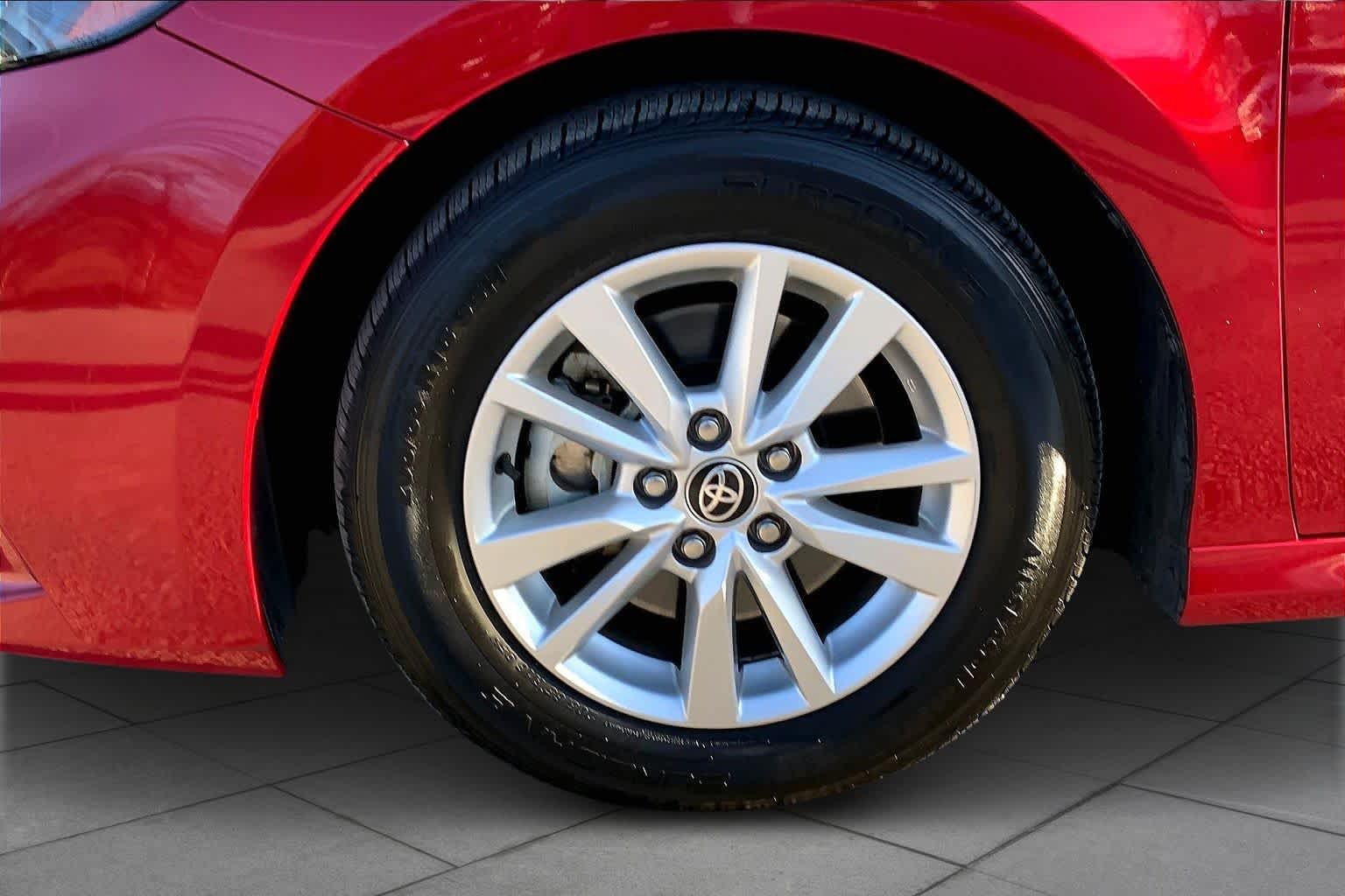 Used 2025 Supersonic Red Toyota LE image 11