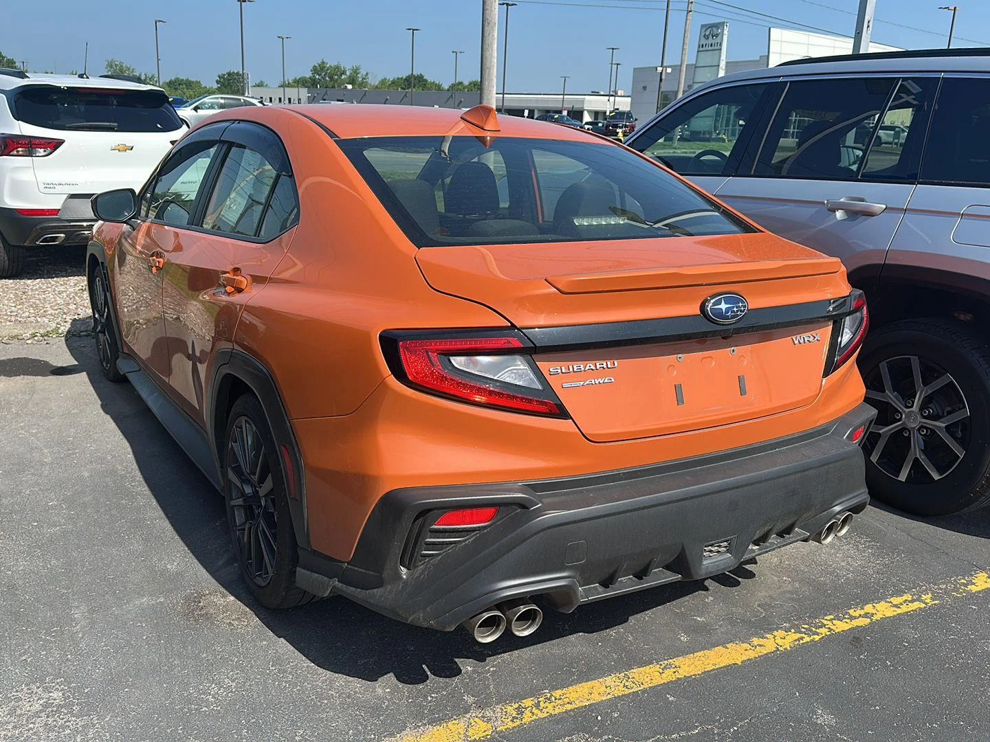Used 2024 Solar Orange Pearl Subaru Premium image 4
