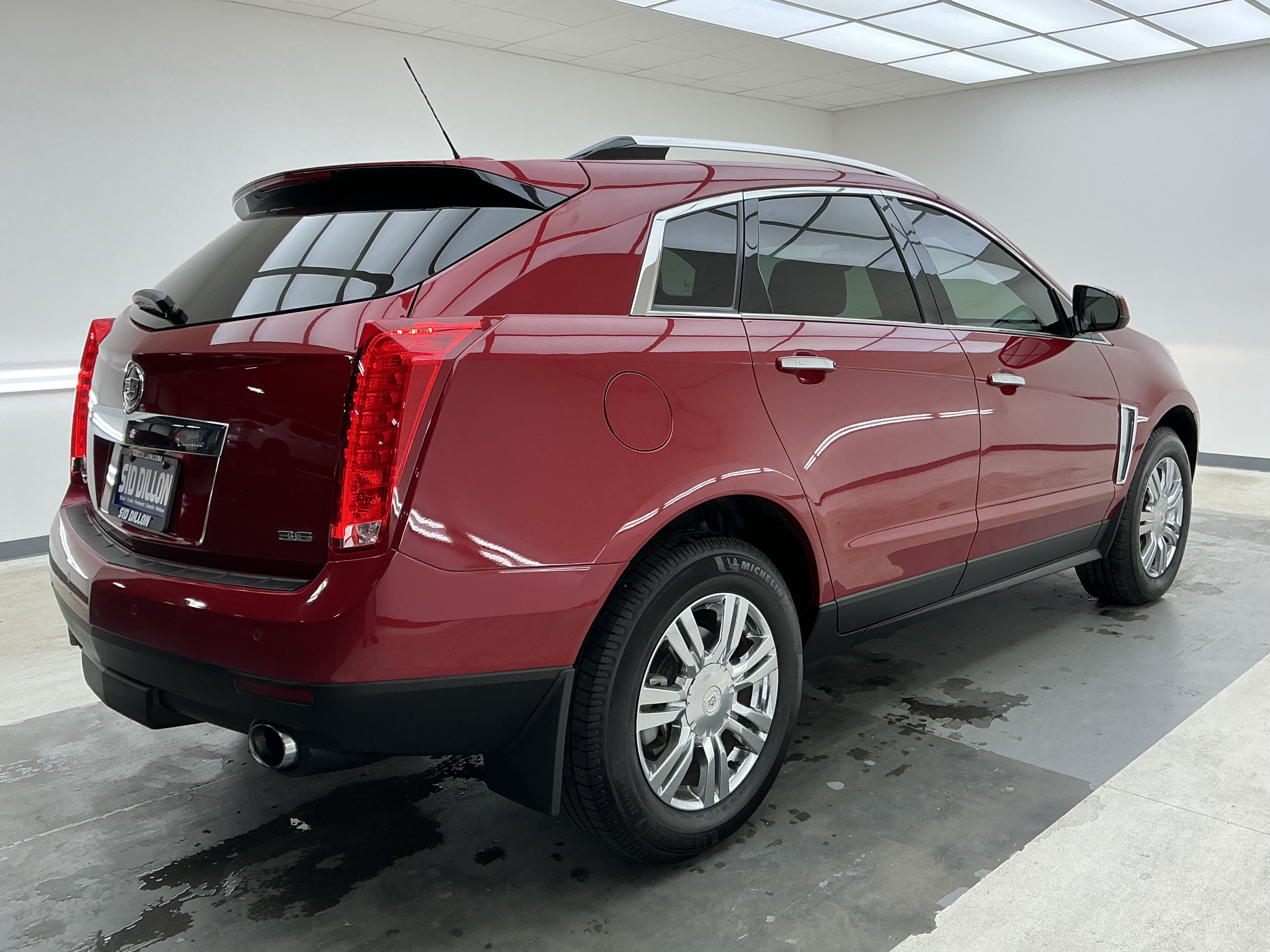 Used 2015 Crystal Red Tintcoat Cadillac Luxury Collection image 4