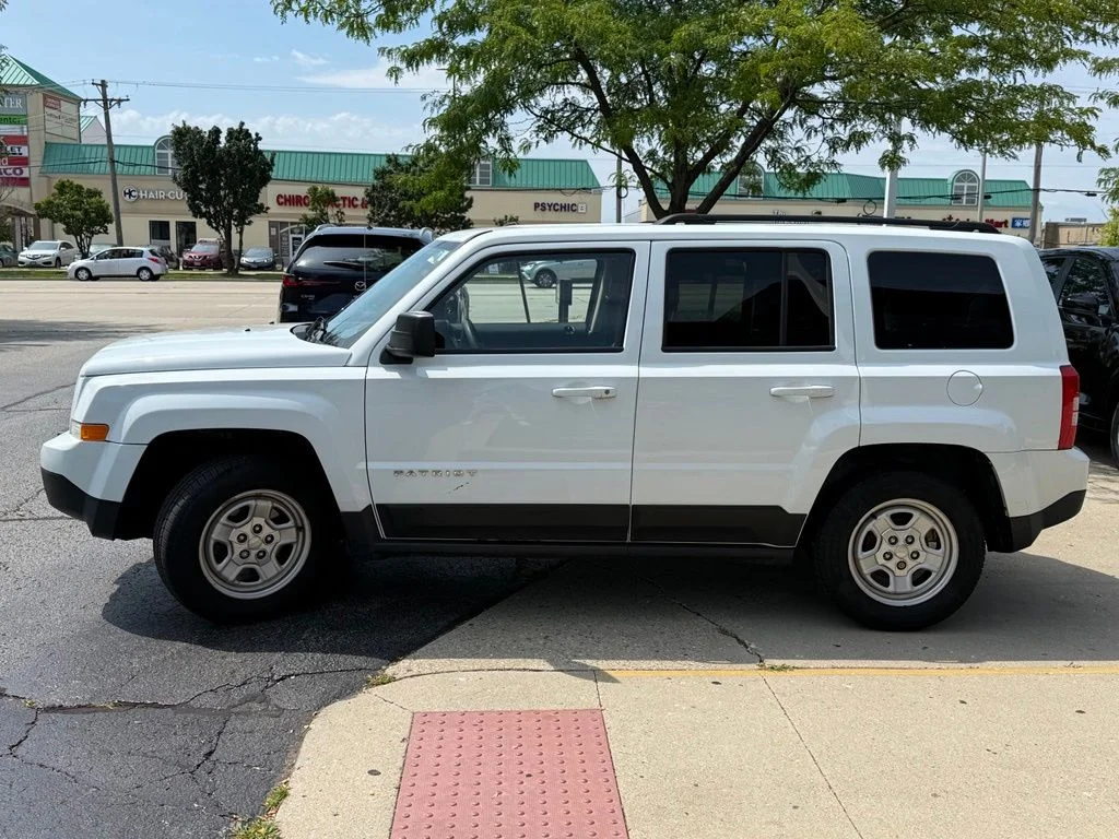 Used 2015 White Jeep Sport image 4