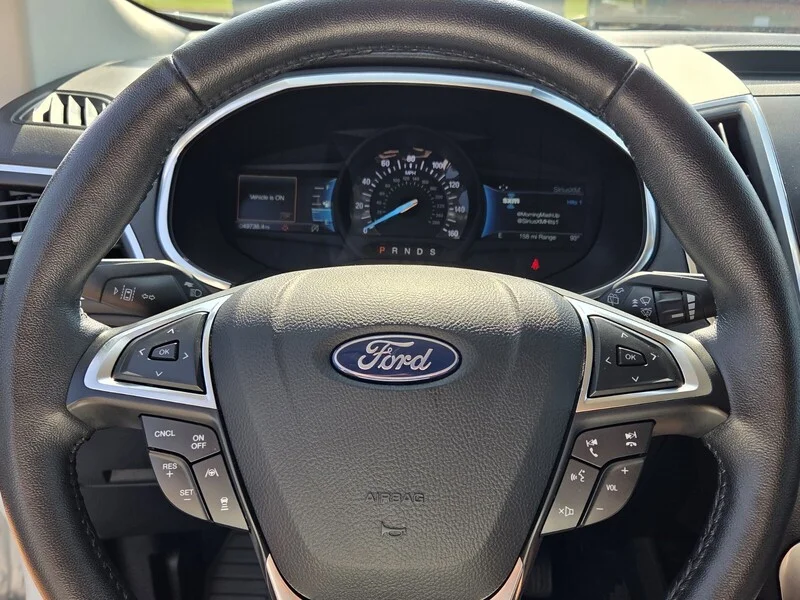 Used 2021 White Metallic FORD TITANIUM image 24