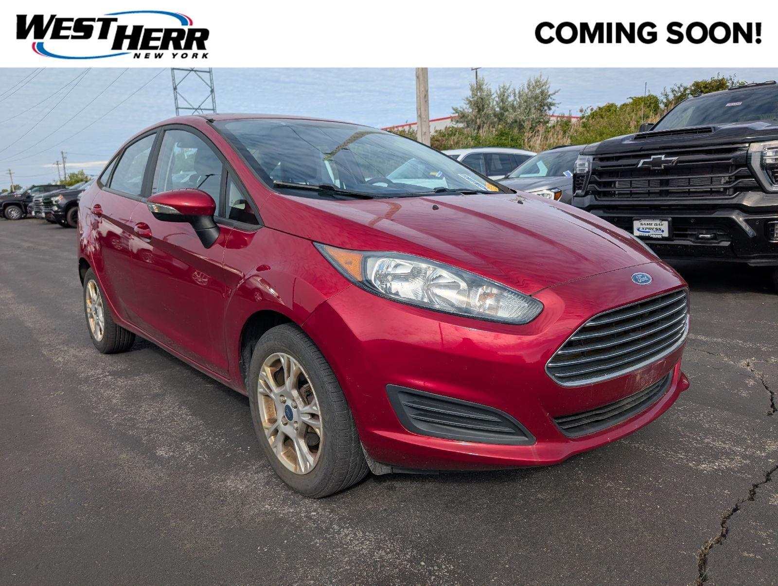 Used 2016 Ruby Red Metallic Tinted Clearcoat Ford SE image 1