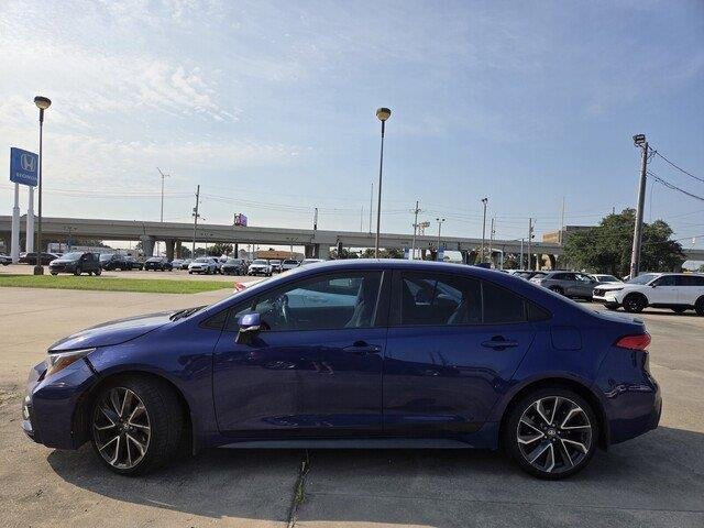Used 2022 Blue Crush Metallic Toyota SE image 6
