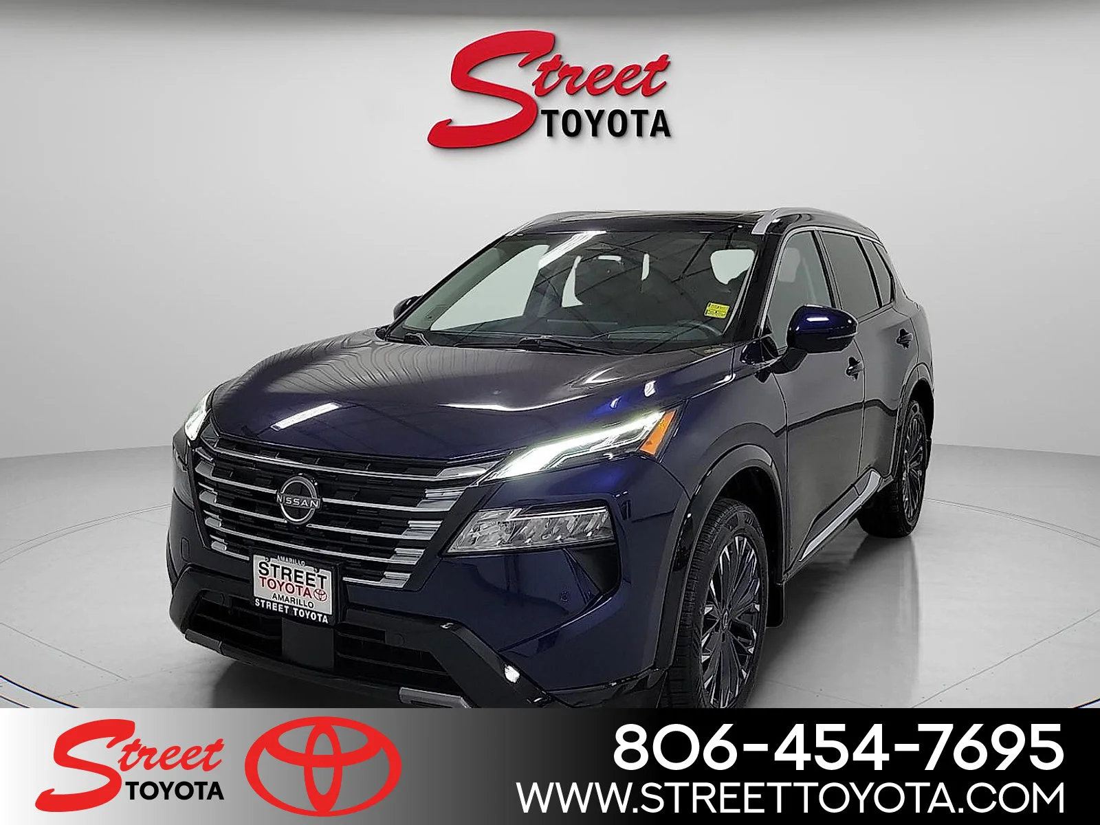 Used 2024 Deep Ocean Blue Pearl Nissan Platinum image 1