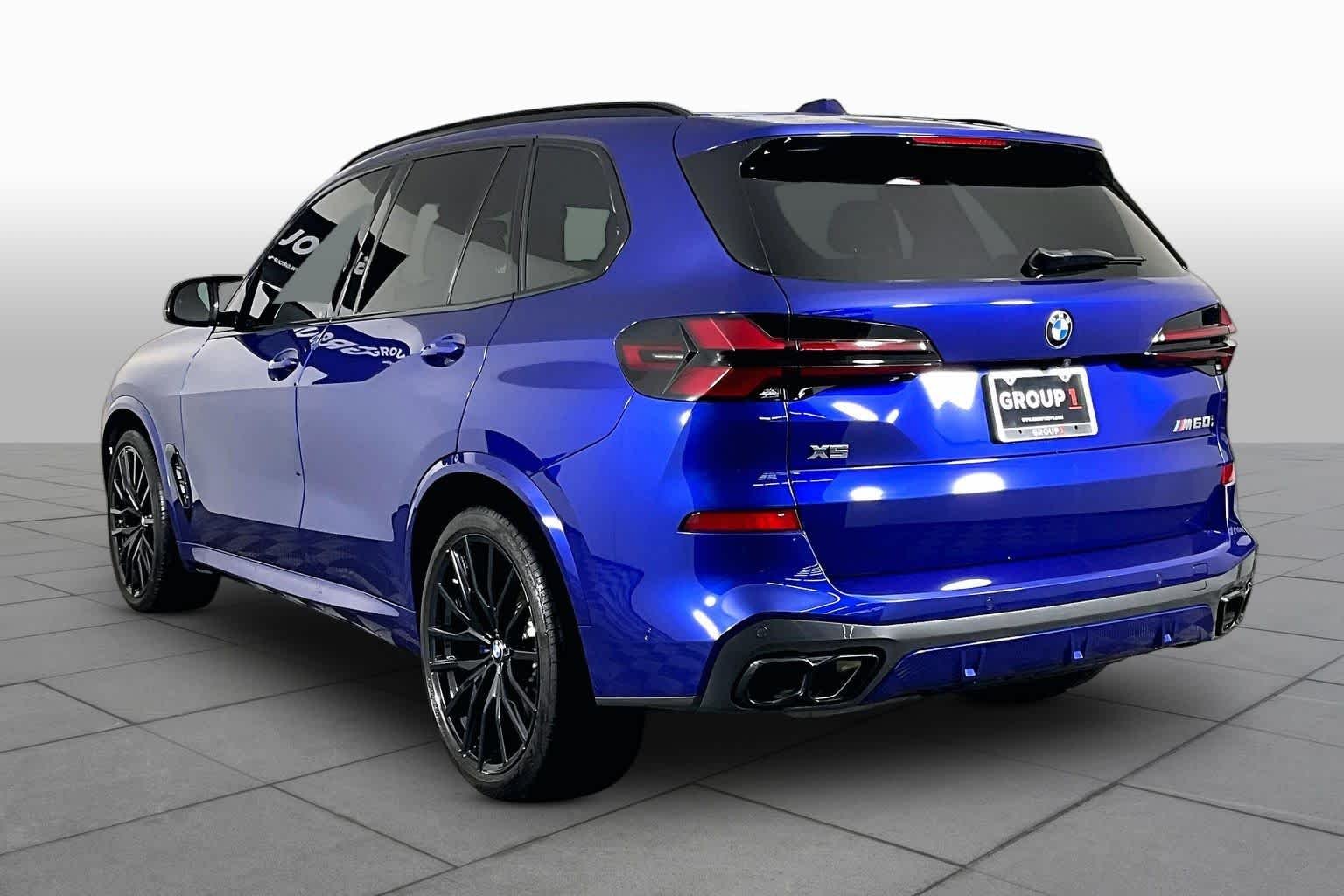 Used 2025 Marina Bay Blue Metallic BMW M60i image 12