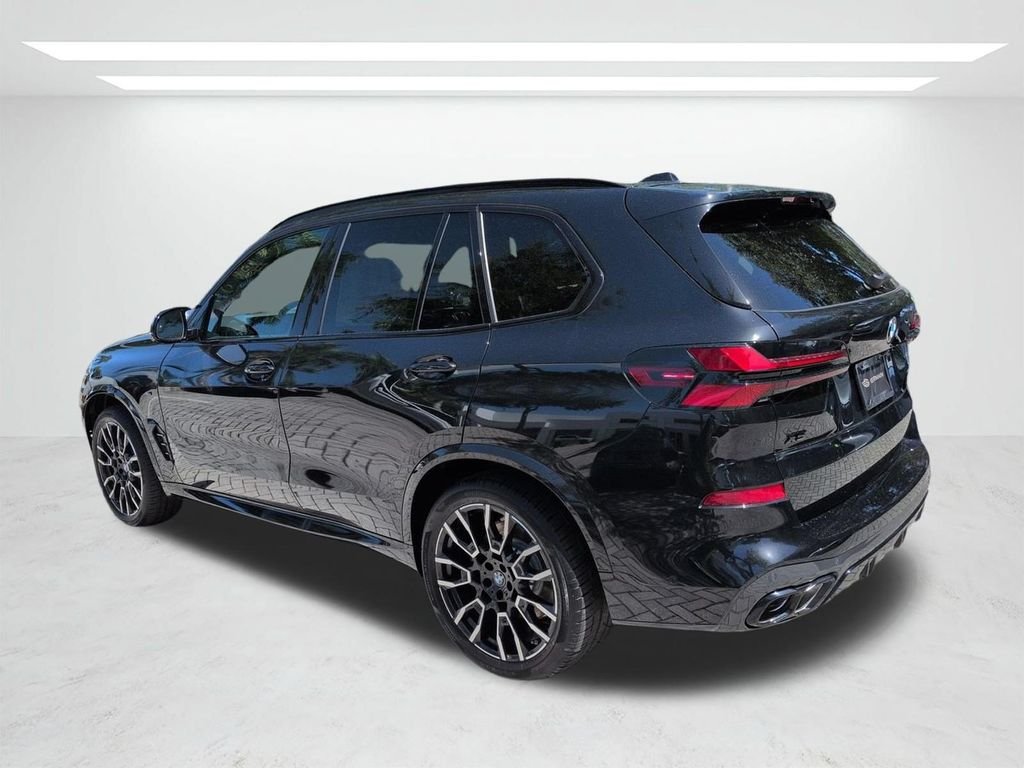 New 2026 Black Sapphire Metallic BMW M60i image 6