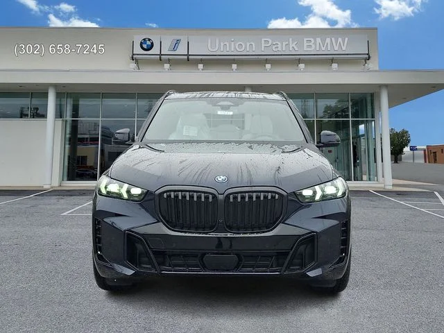 New 2026 Carbon Black Metallic BMW xDrive50e image 2