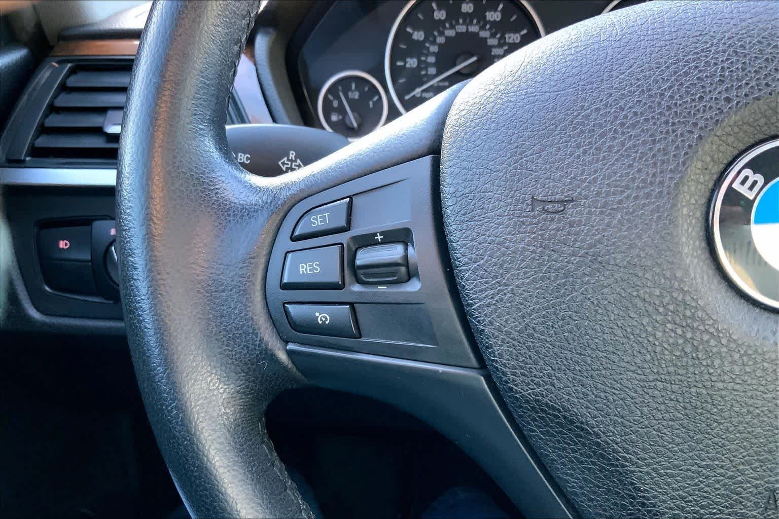 Used 2015 Black Sapphire Metallic BMW 320i image 24