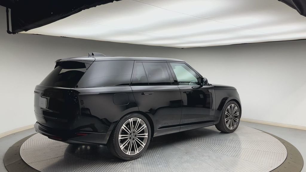 Used 2024 Santorini Black Metallic Land Rover SE image 2