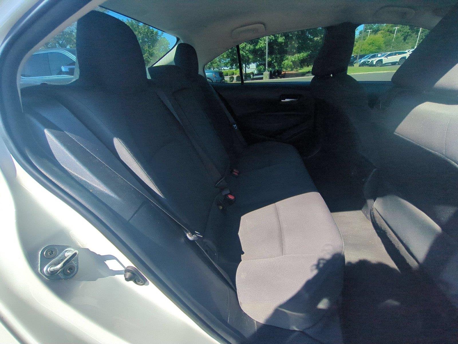 Used 2021 Super White Toyota LE image 32