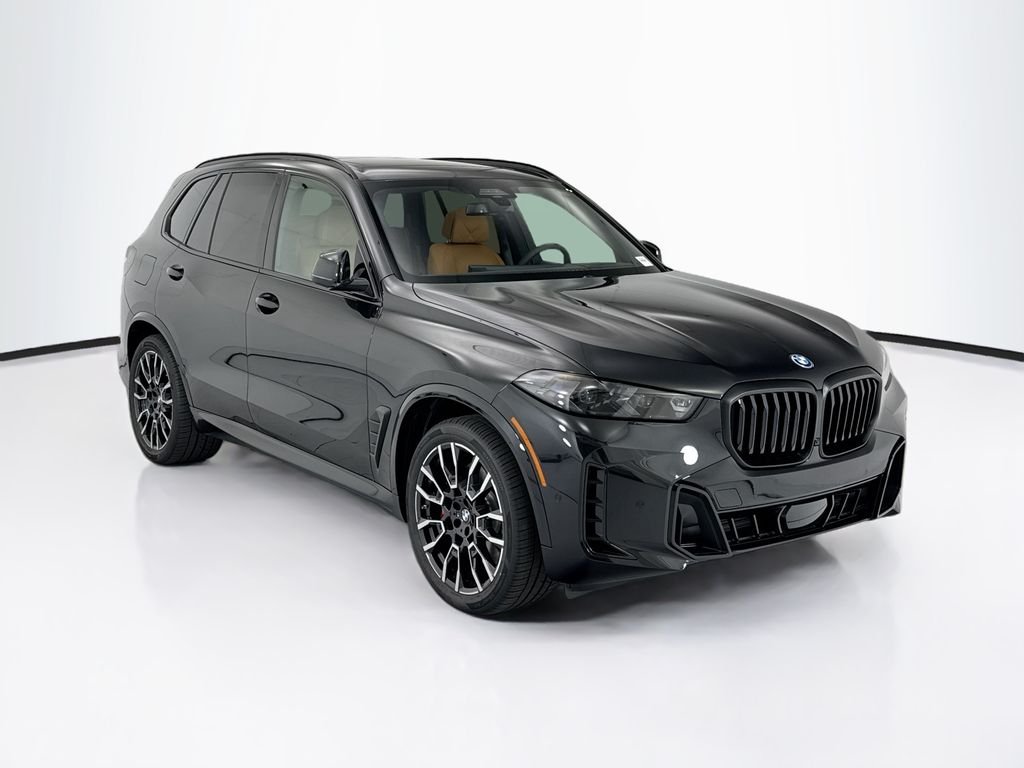 New 2026 Black Sapphire Metallic BMW xDrive50e image 3