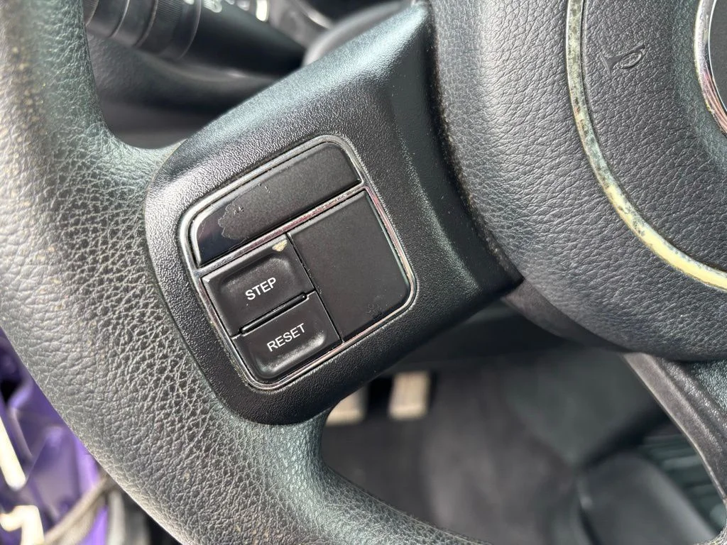 Used 2017 Purple Jeep Unlimited Sport image 12