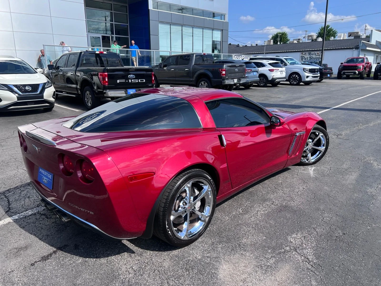 Used 2012 Crystal Red Tintcoat Chevrolet Grand Sport image 18