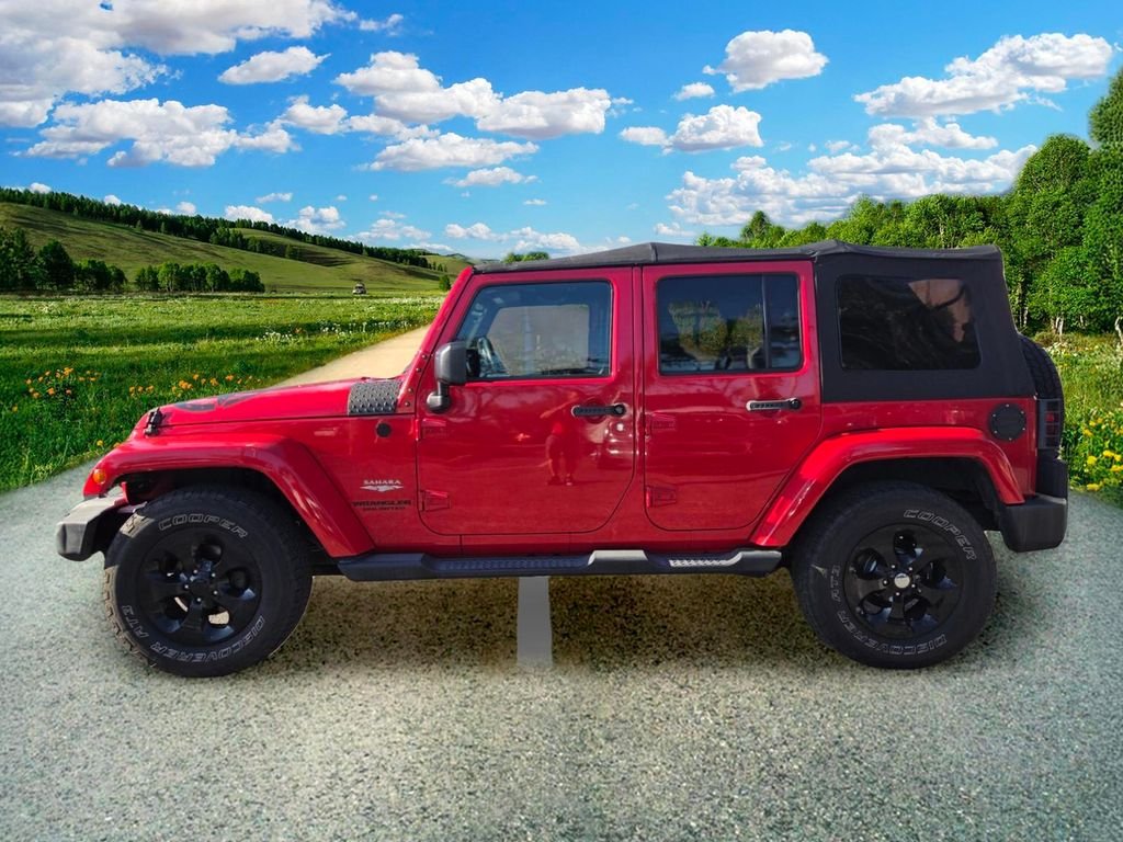 Used 2015 Red Jeep Unlimited Sahara image 3