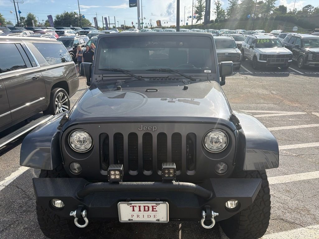 Used 2017 Gray Jeep Sport image 1
