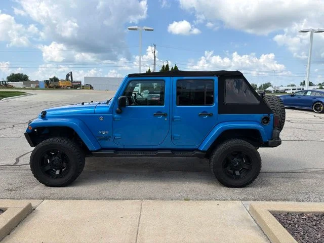 Used 2016 Blue Jeep Unlimited Sahara image 9