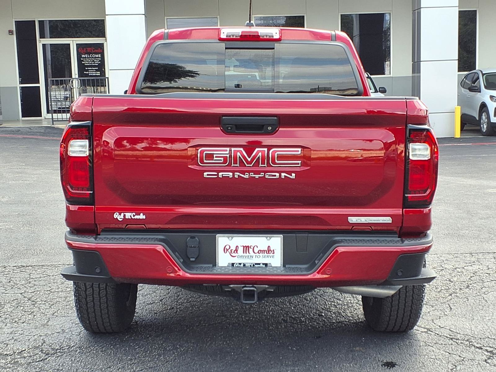Used 2024 Volcanic Red Tintcoat GMC 2WD Elevation image 6