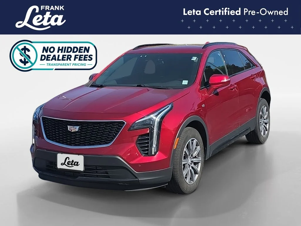 Used 2023 Radiant Red Tintcoat Cadillac Sport image 1