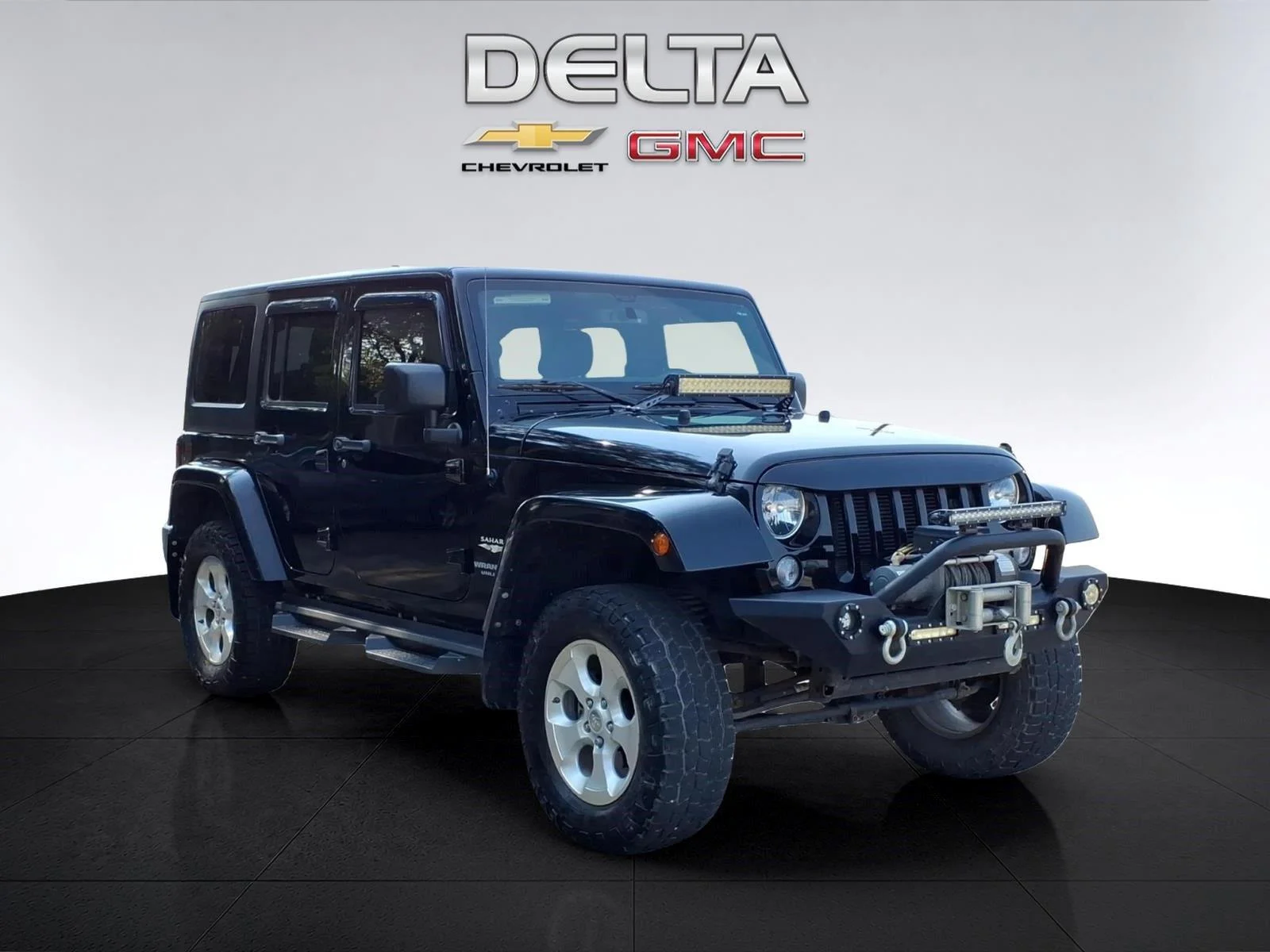 Used 2015 Black Clearcoat Jeep Sahara image 7