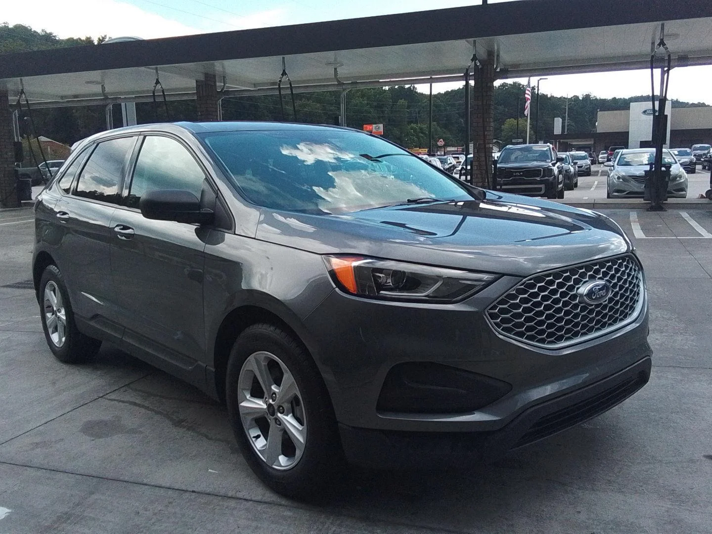 Used 2023 Carbonized Gray Metallic Ford SE image 1