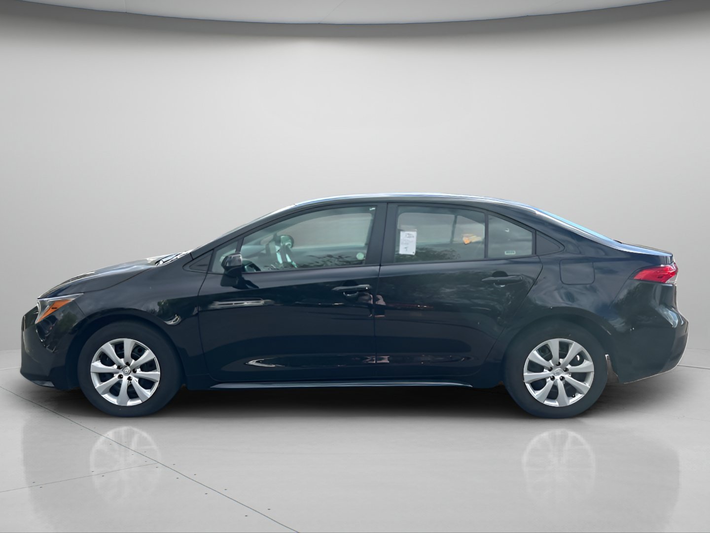 Used 2025 Midnight Black Metallic Toyota LE image 13