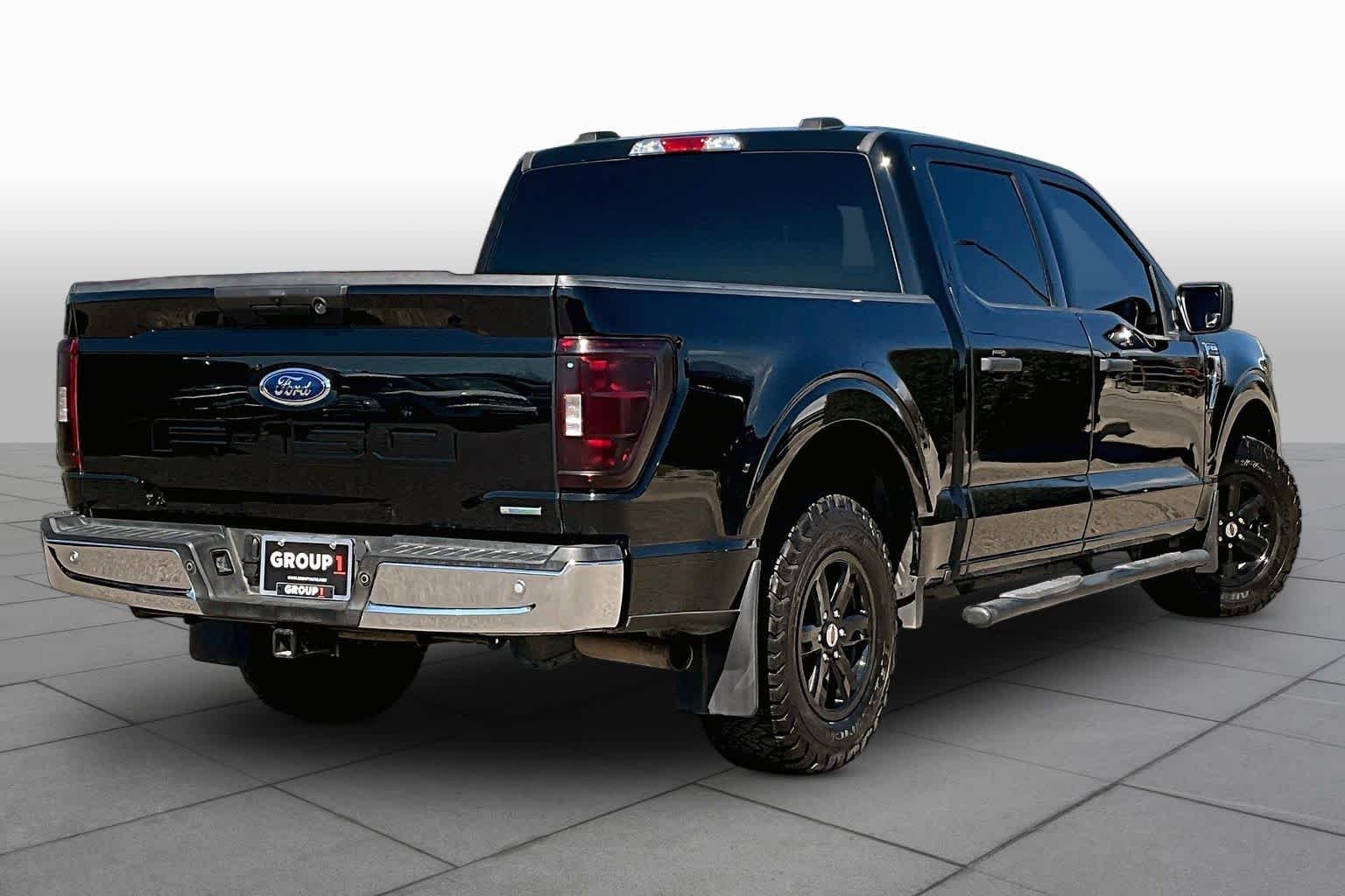 Used 2023 Agate Black Metallic Ford XLT image 25