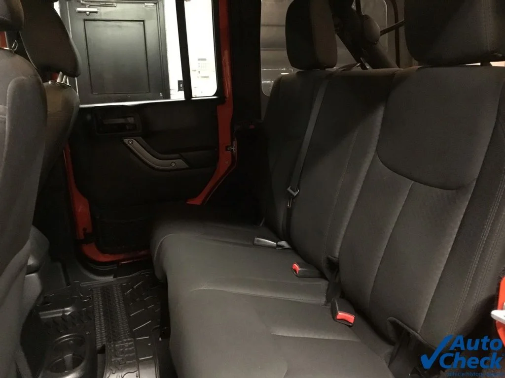 Used 2015 Orange Jeep Unlimited Sport image 32