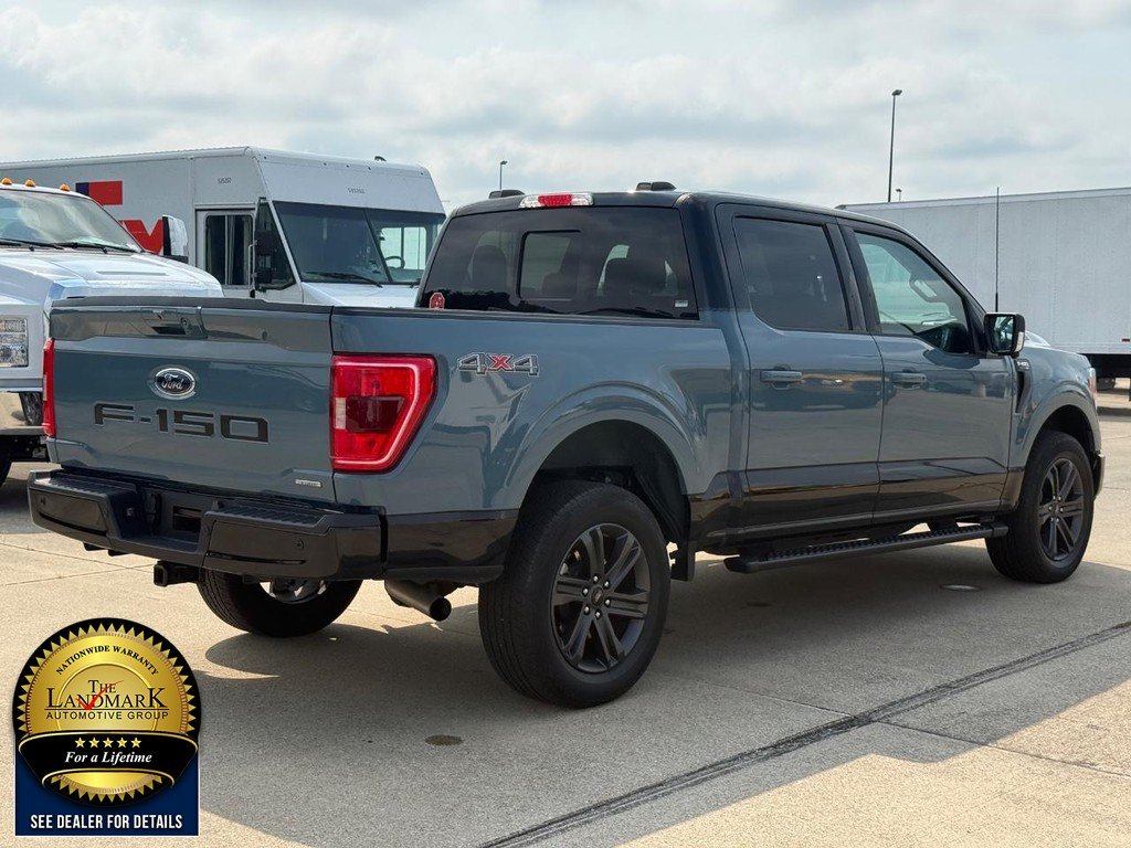 Used 2023 Area 51 Blue Ford XLT 4WD SuperCrew 6.5