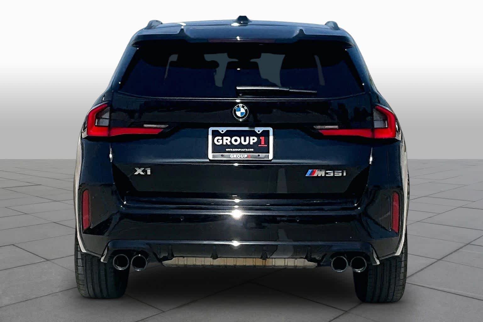 Used 2026 Black Sapphire Metallic BMW M35i image 4