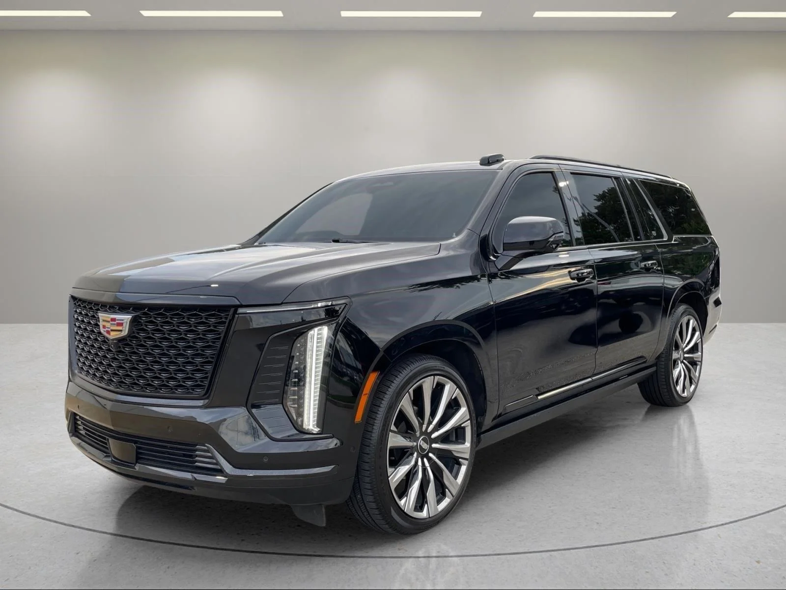 Used 2025 Black Raven Cadillac 4WD Premium Luxury image 1