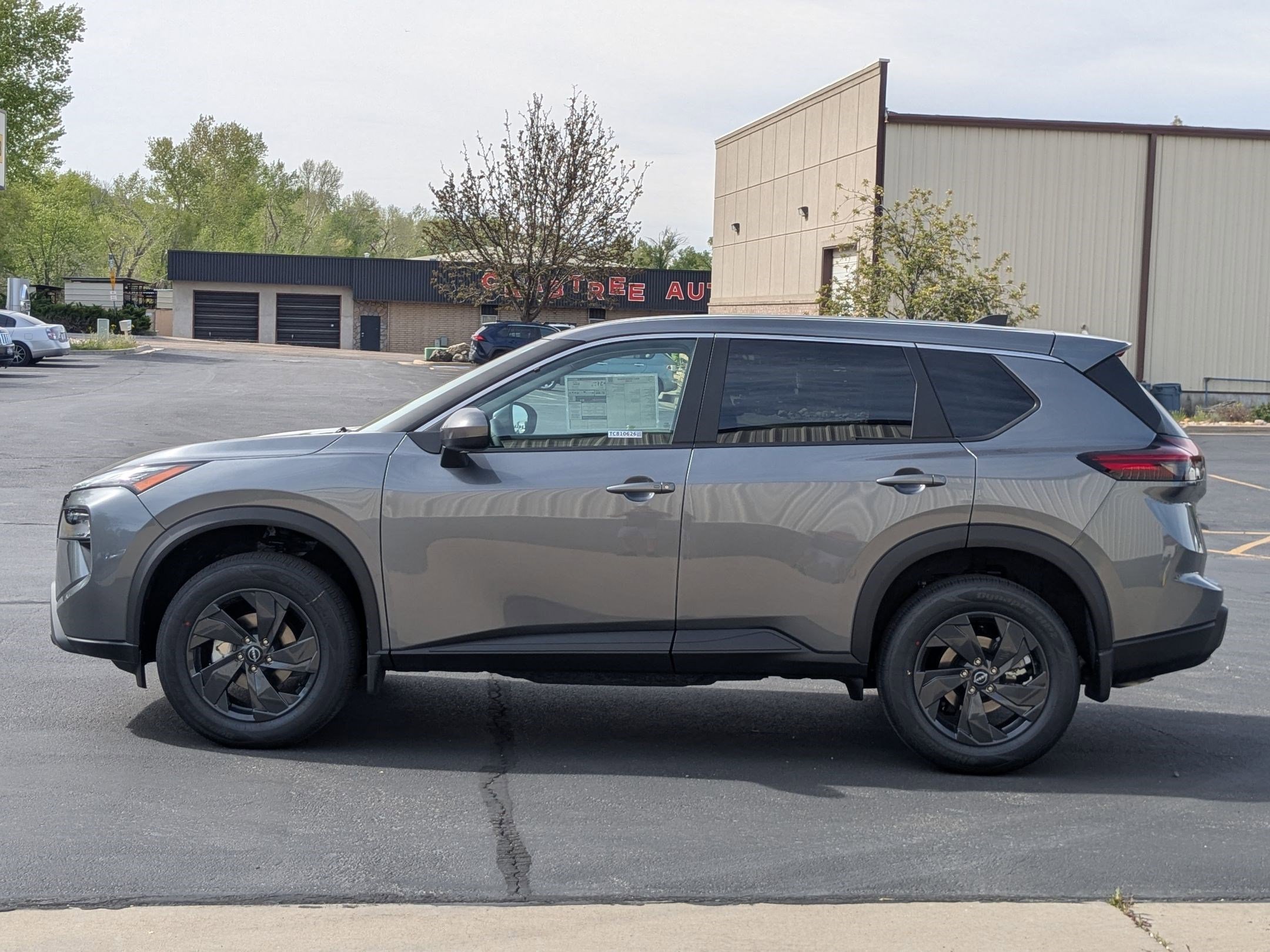 New 2026 Gun Metallic Nissan SV image 7