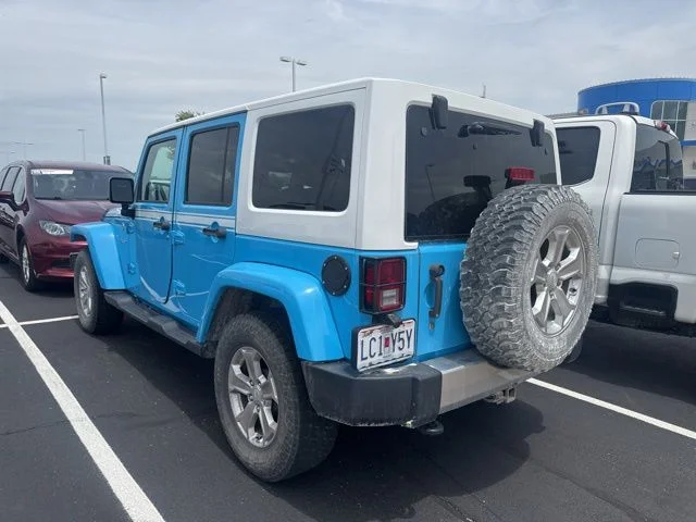 Used 2017 Blue Jeep Unlimited Sahara image 4