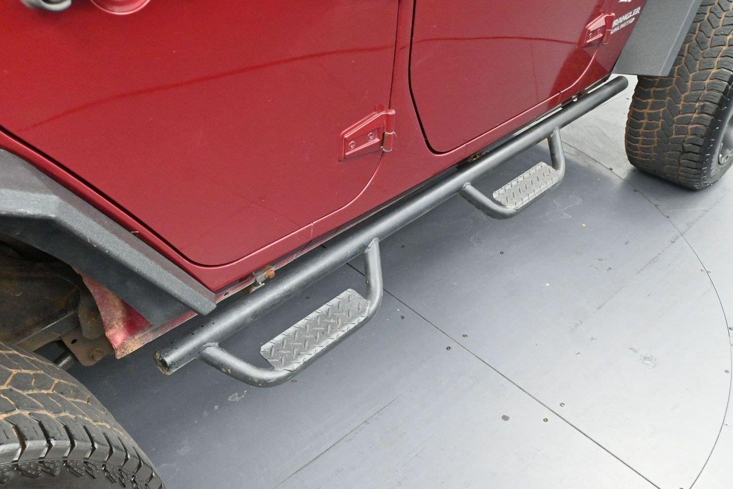 Used 2011 Deep Cherry Red Crystal Pearlcoat Jeep Sahara image 9