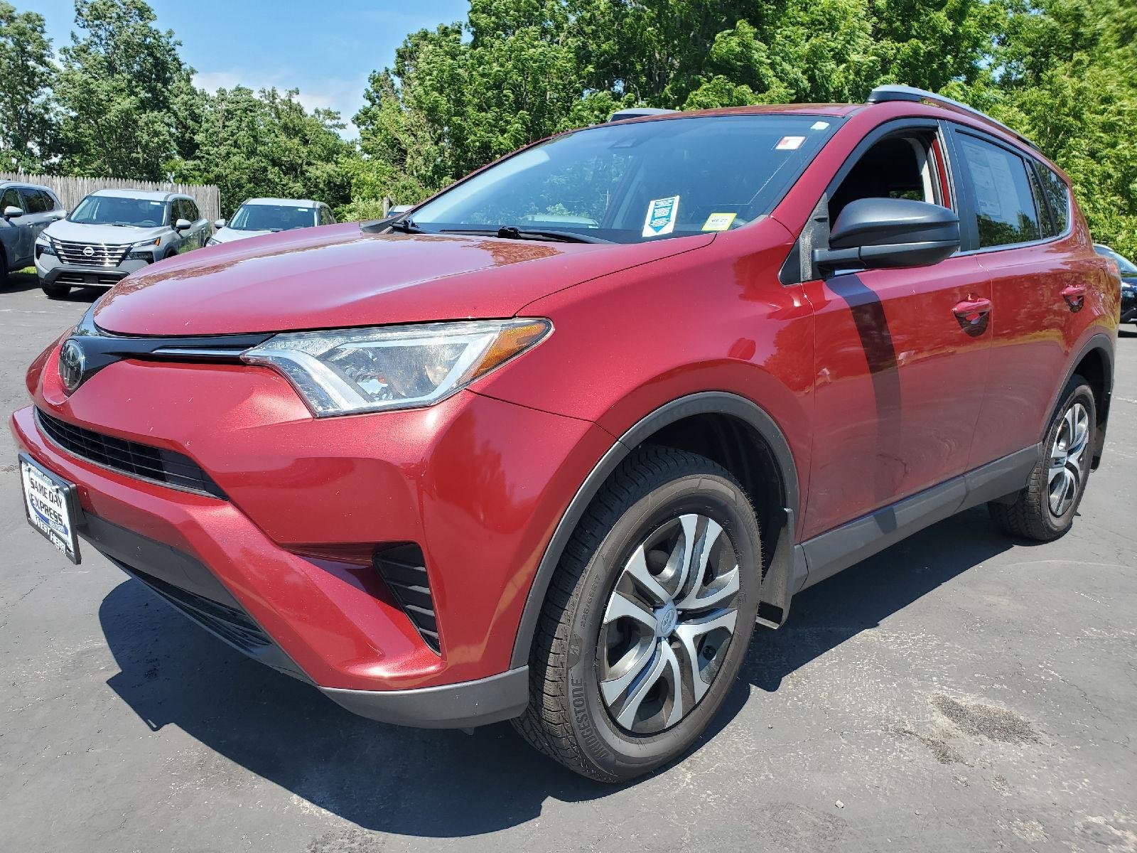 Used 2018 Ruby Flare Pearl Toyota LE image 4