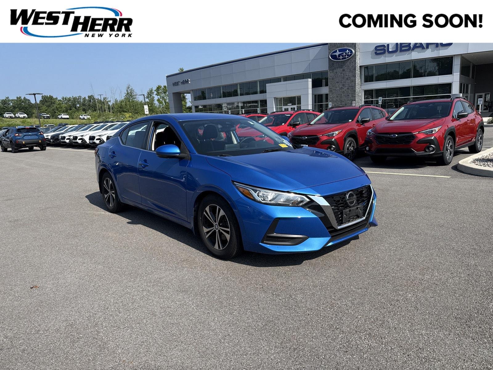 Used 2020 Electric Blue Metallic Nissan SV image 1