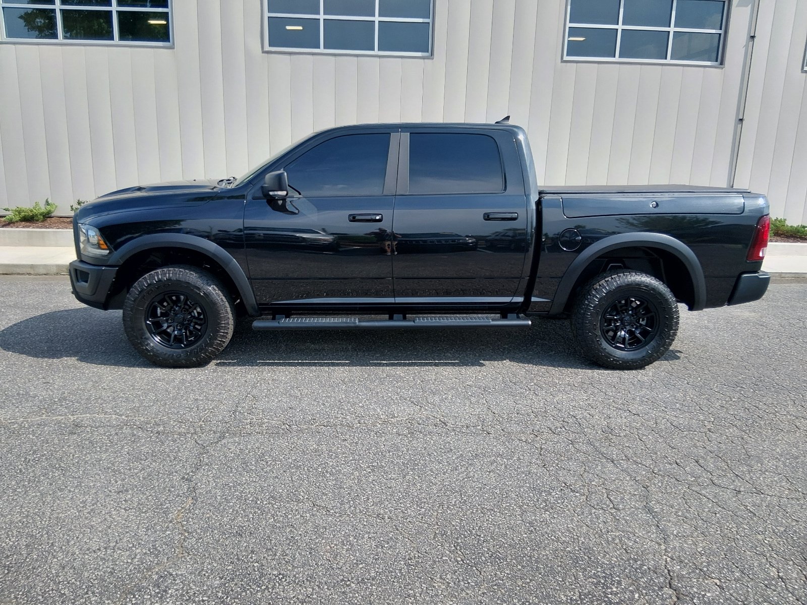 Used 2017 Brilliant Black Crystal Pearl Coat Ram 4x4 Rebel 4dr Crew Cab 5.5 ft. SB Pickup image 6